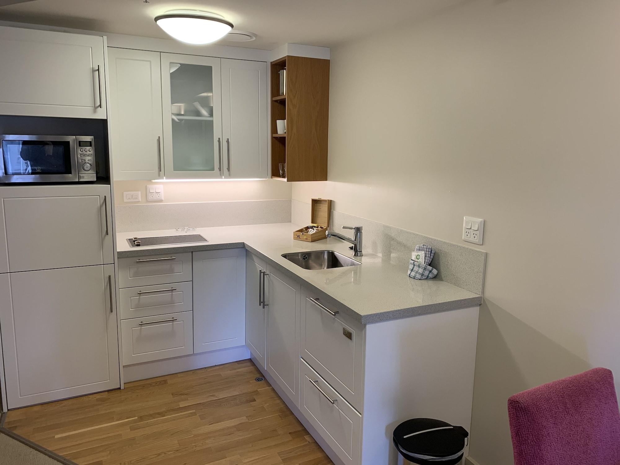 오클랜드 Vr 타카푸나 아파트 호텔 외부 사진 A typical kitchen in a student apartment